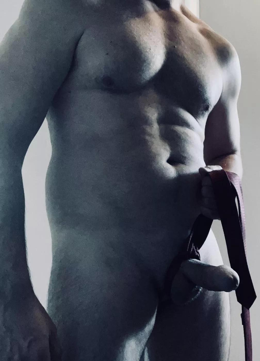 Am I wearing this right?  Could you please help me with this tie? posted by howlinwolf4u2