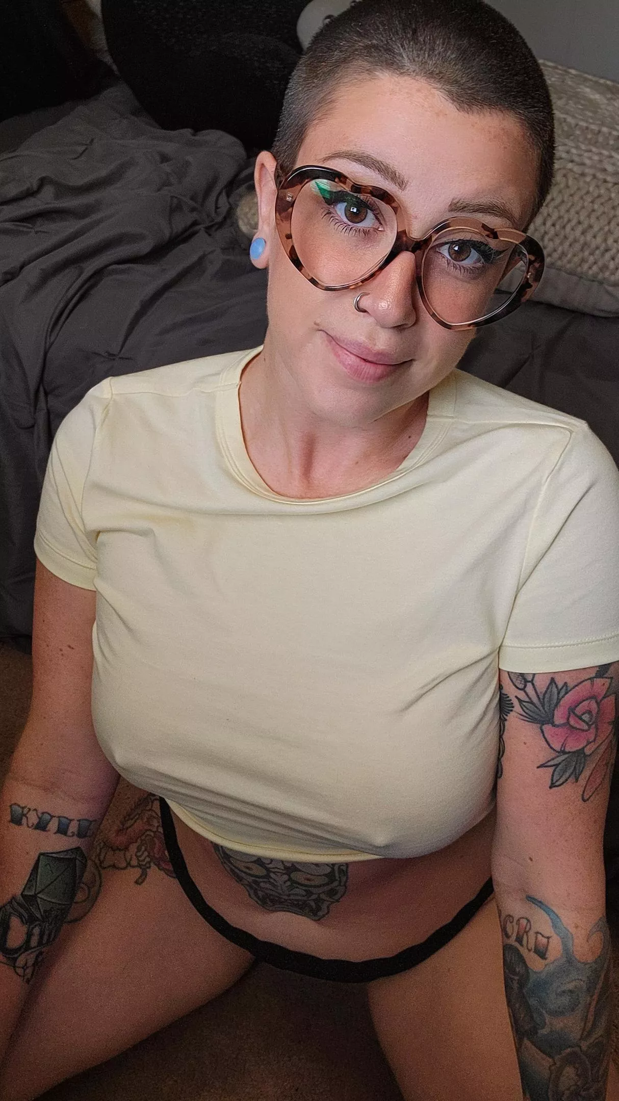 No hair* no bra* big brown eyes*  posted by Kirsten_pamyu