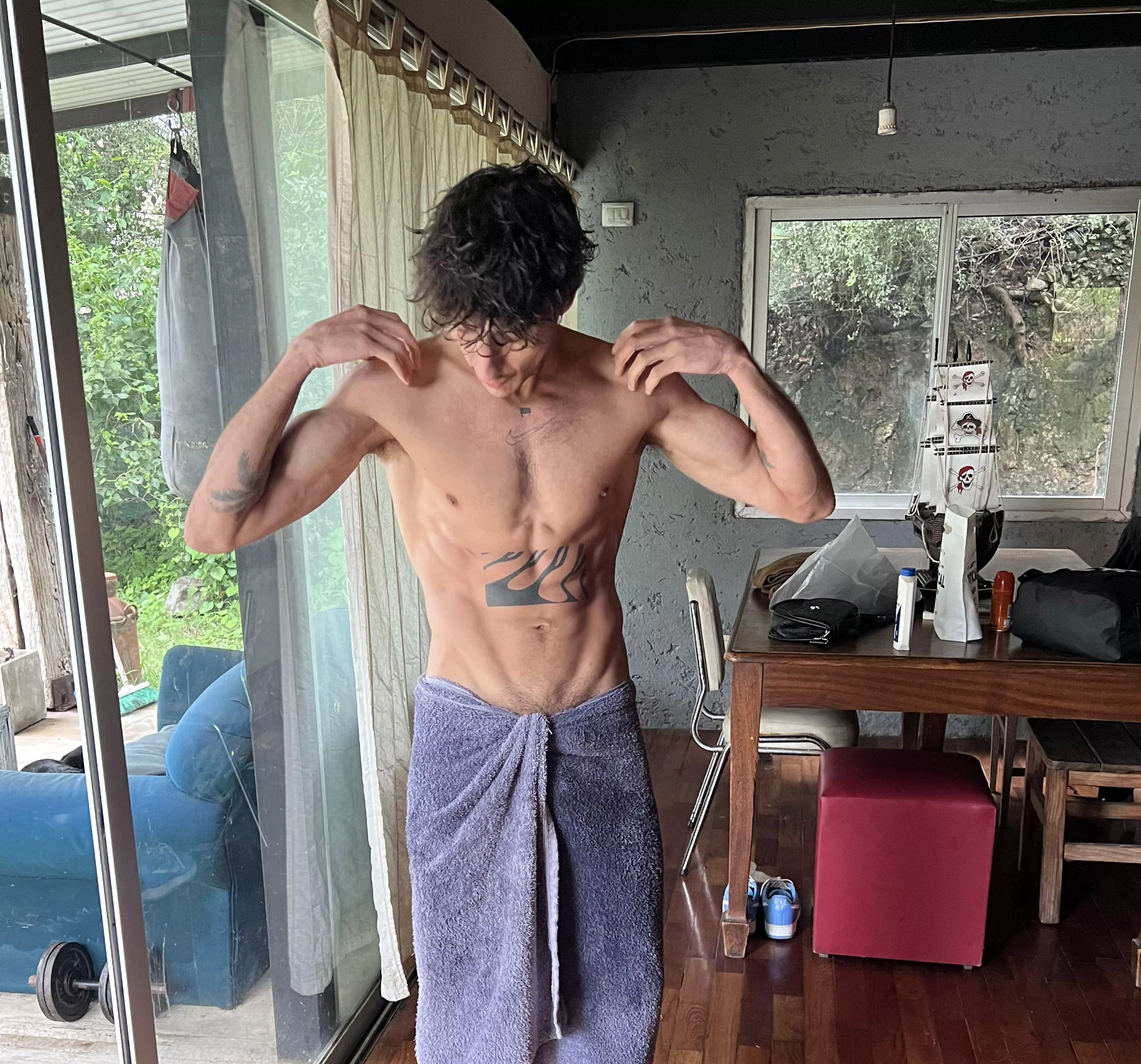 guess what the tattoo on my abdomen is posted by fardamn