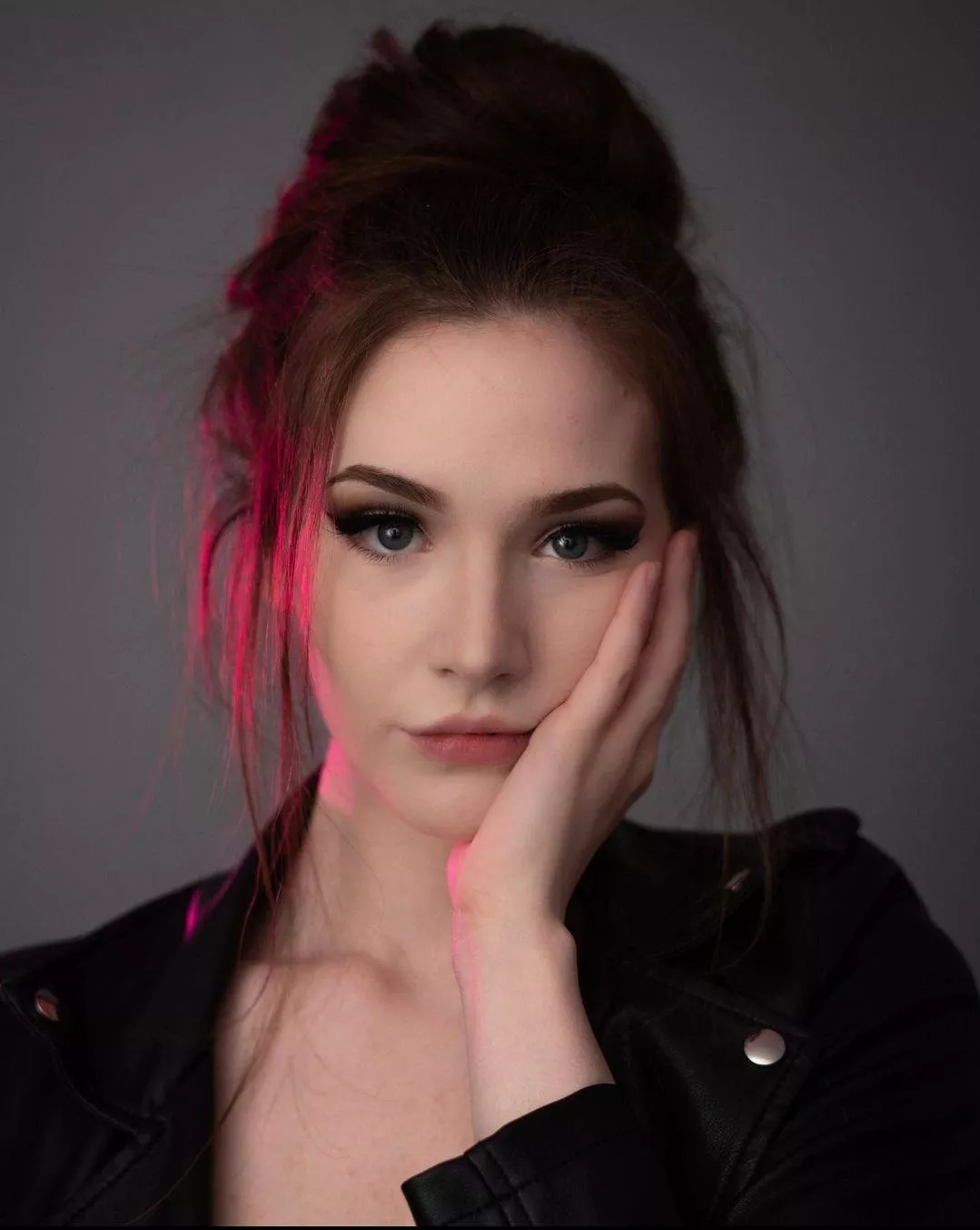 Old pic of me in a leather jacket  posted by Tiny-Arrival-8540