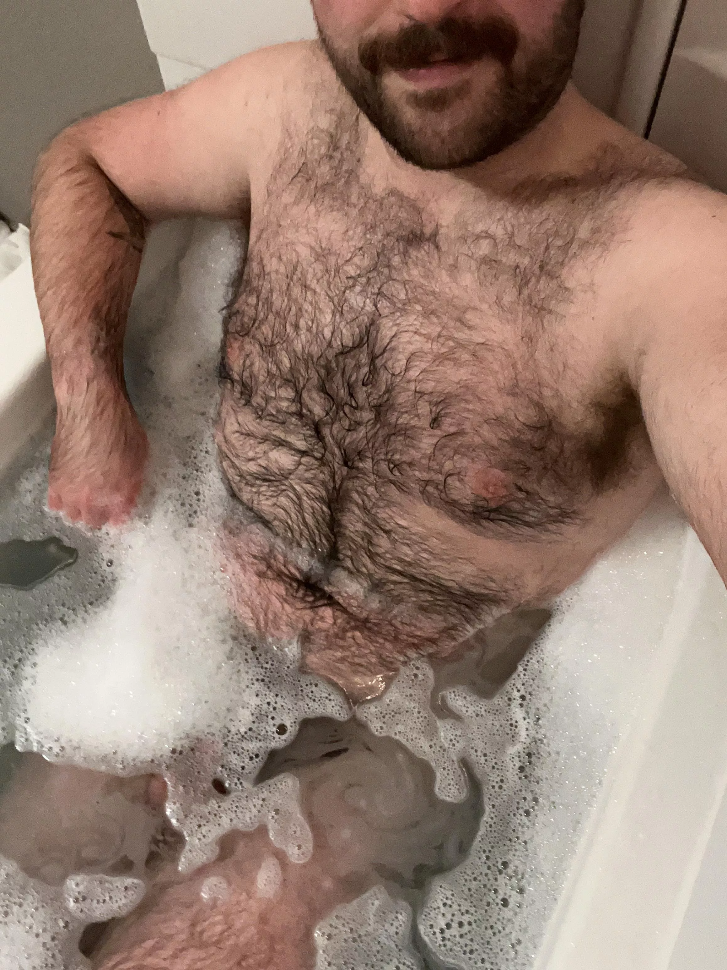 Just a hairy cub relaxing in the tub 🛀 posted by Bottomguy55