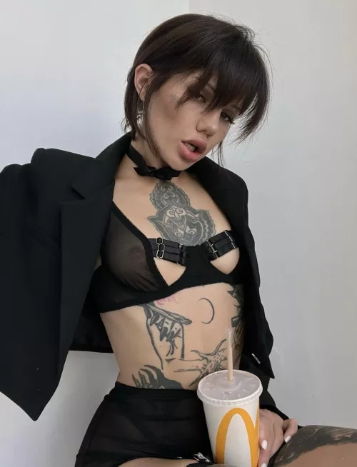 Serious woman loves Happy Meals and Coke by Coilingfog782