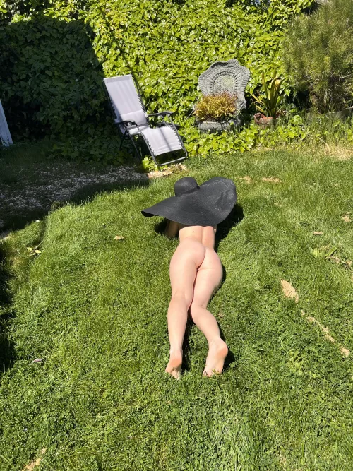 I'm lying on the grass, unaware that my neighbor is filming me with a drone by SugarNadya_forever