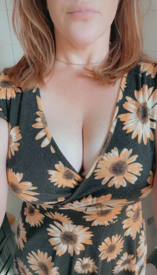 Redhair and sunflowers  by GngrPeach