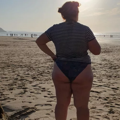 Dimple cheeks on the beach by JosieAndYou