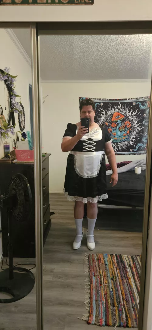 I very much enjoy cleaning while wearing a maids outfit with small heels. This was voluntary, but it would be so much better if I were doing it for a Domme.  by J3ST3R_13