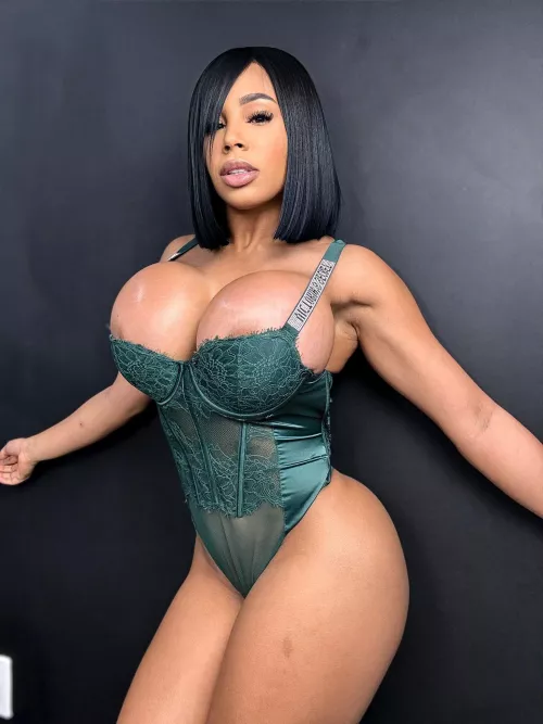 I like this outfit on her. Very elegant but still sexy. by trophylover