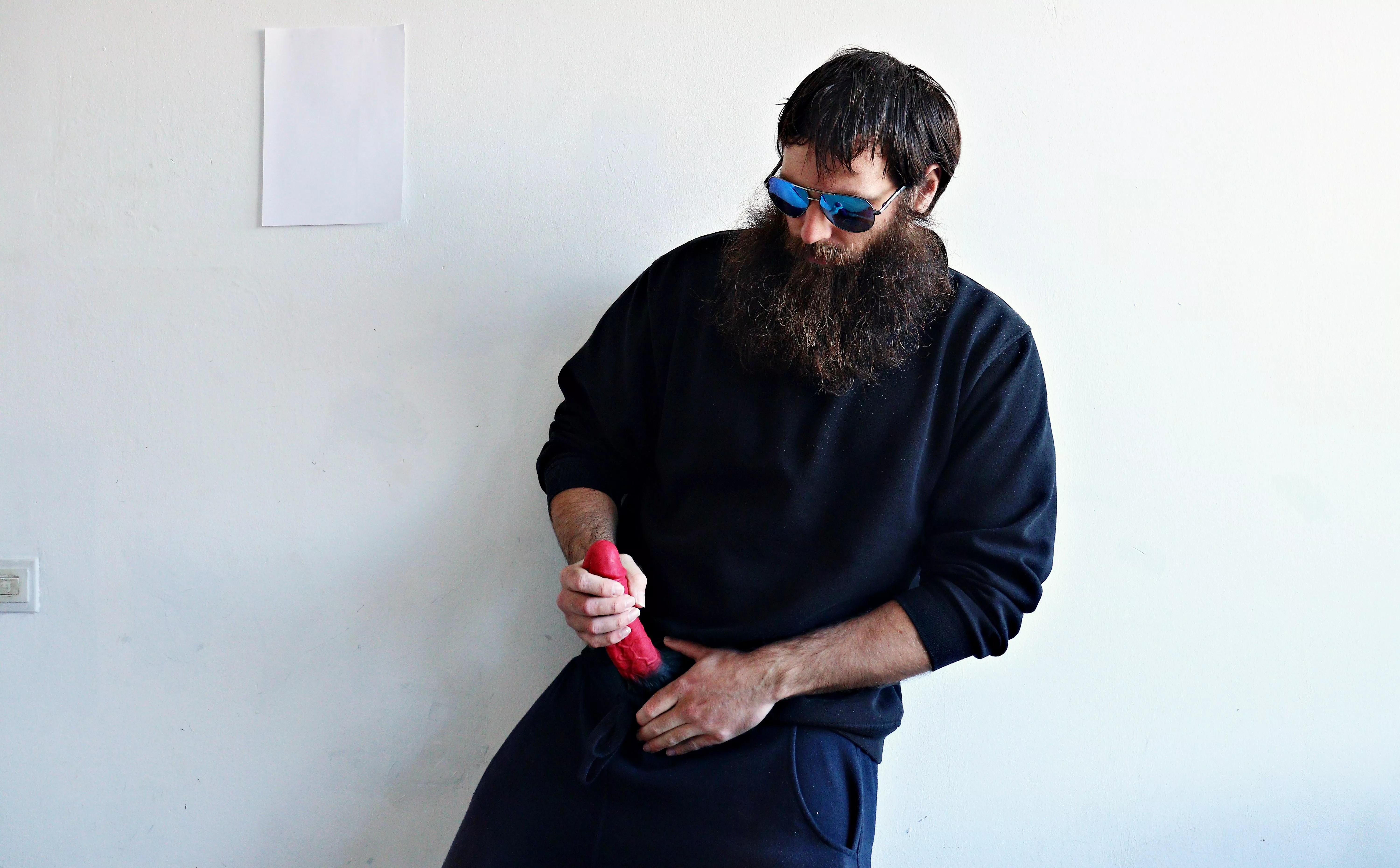 Me, with a large red dildo, while I am wearing sunglasses posted by Mysterious-Man1