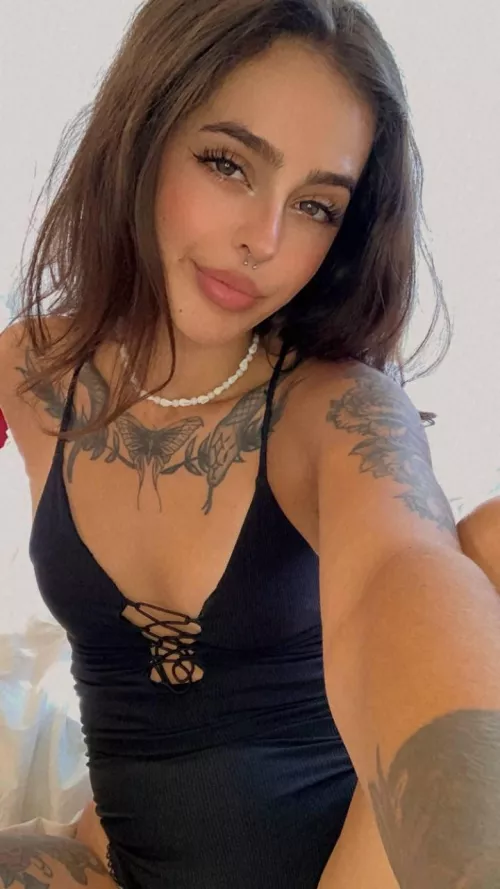 Thinking about getting more tattoo's, but do guys even like girls with tattoos's and piercings?.. by ijw5621