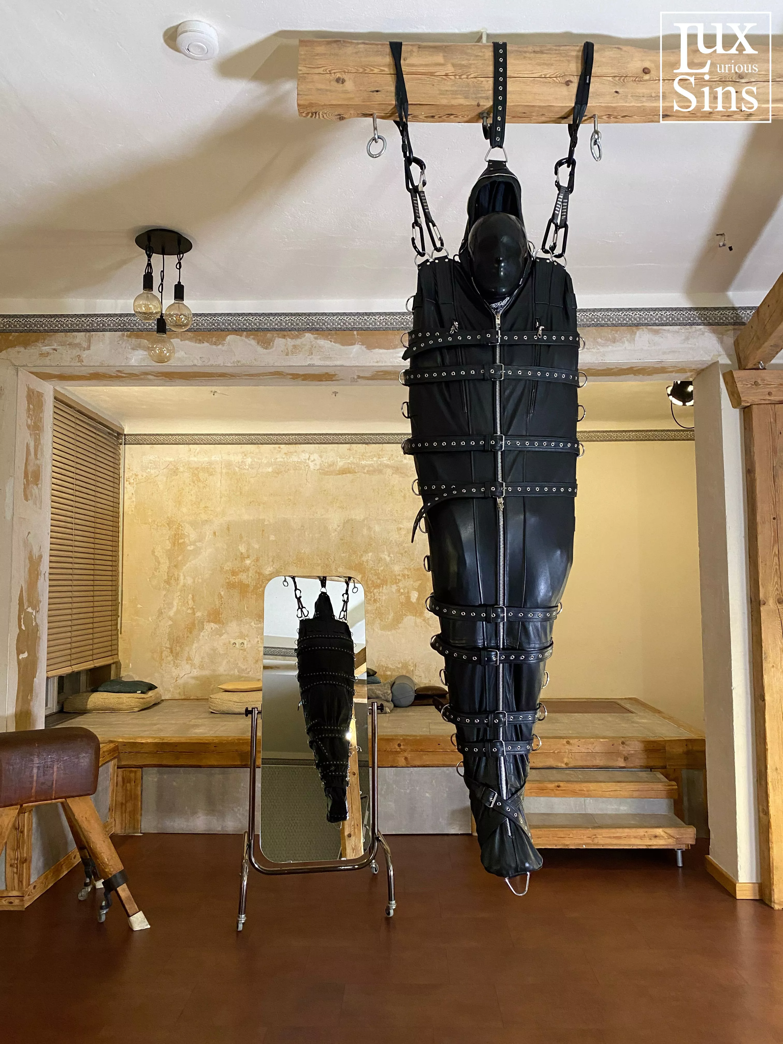 Suspended from the ceiling in a leather sleepsack posted by LuxuriousSins