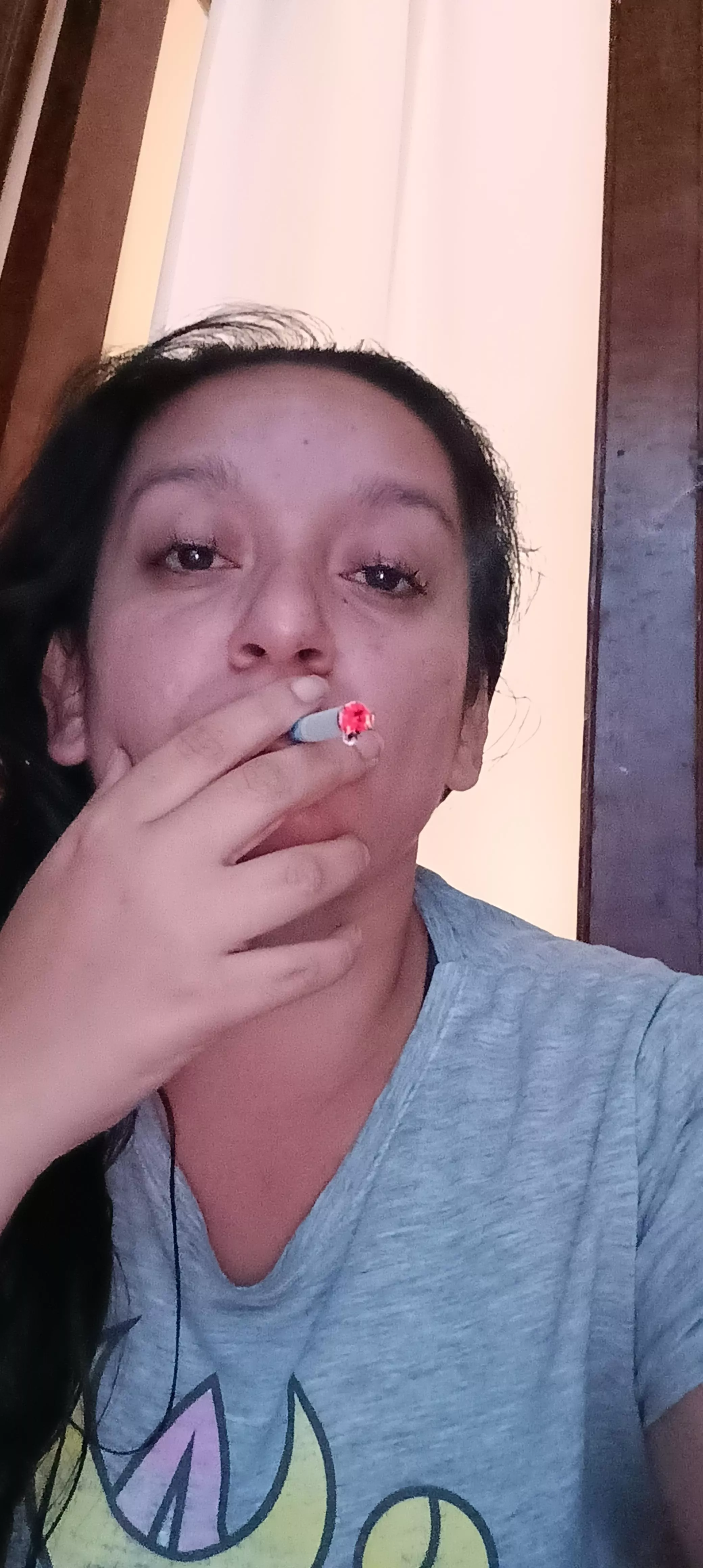 alone, the best company of a cigarette posted by la_mami_latina