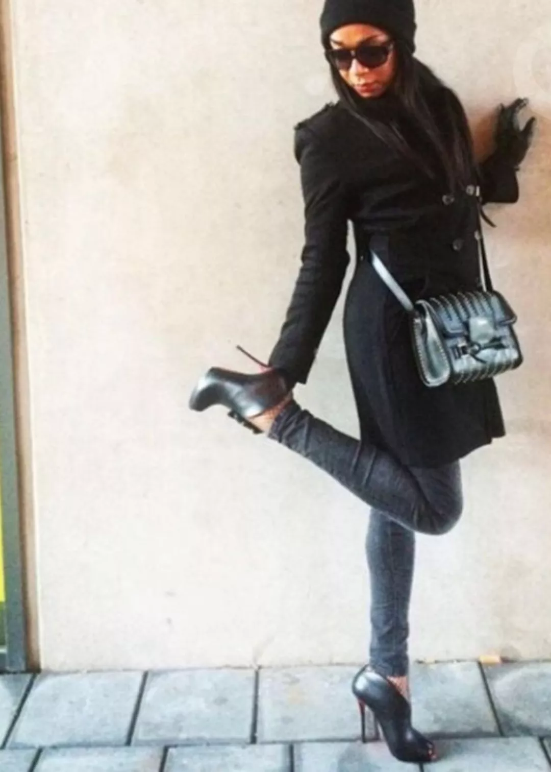 A lady in the streets... posted by Square_Grand_8342