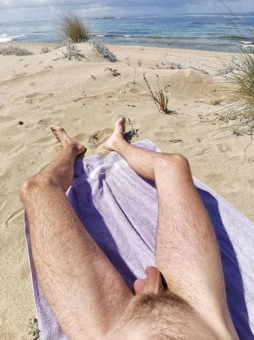 First time posting me sunbathing nude at a public beach (M25, soft)  by Turbulent_Bedroom214