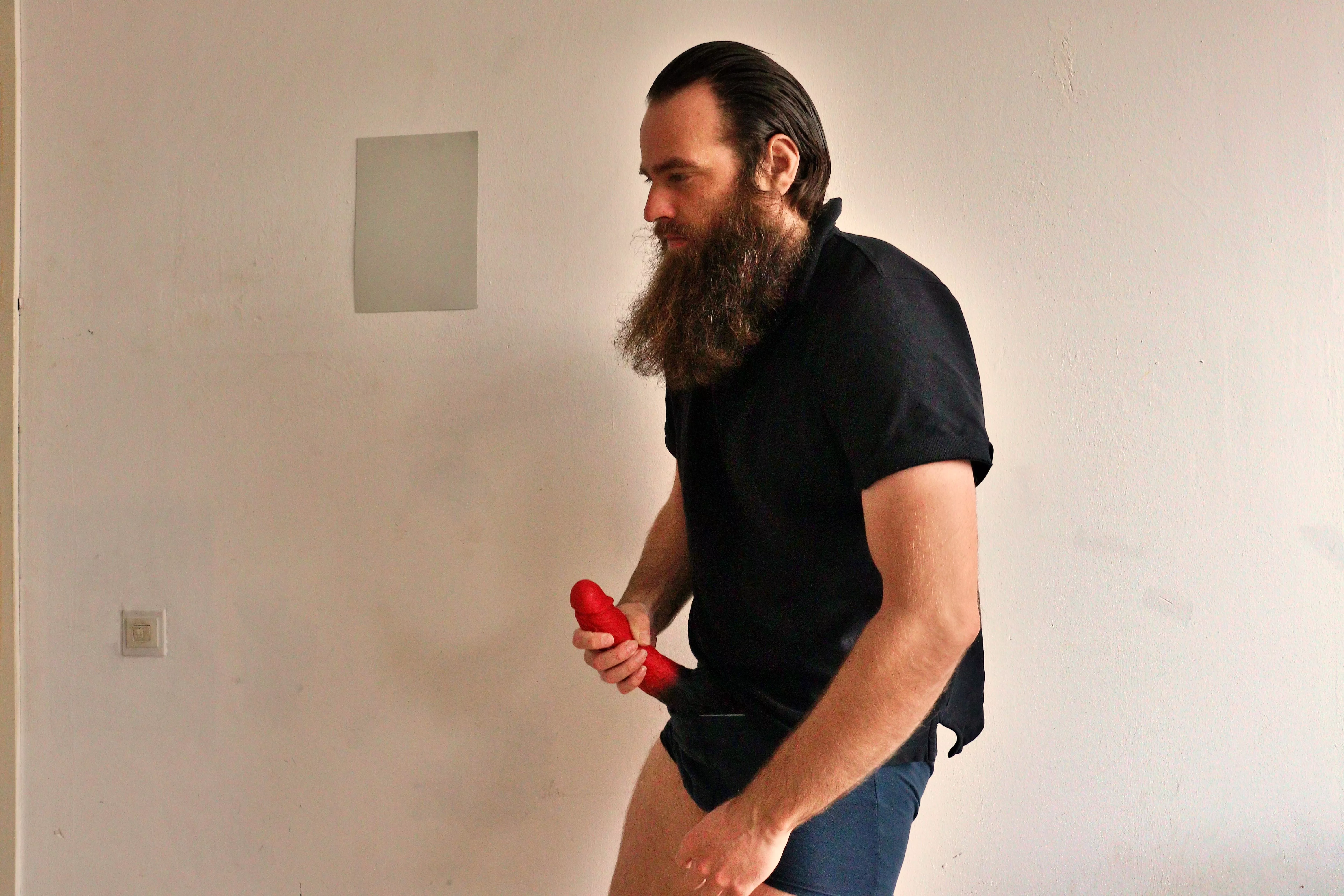 Me, while a 10,5 inch red dildo sticks out of my underwear posted by Mysterious-Man1