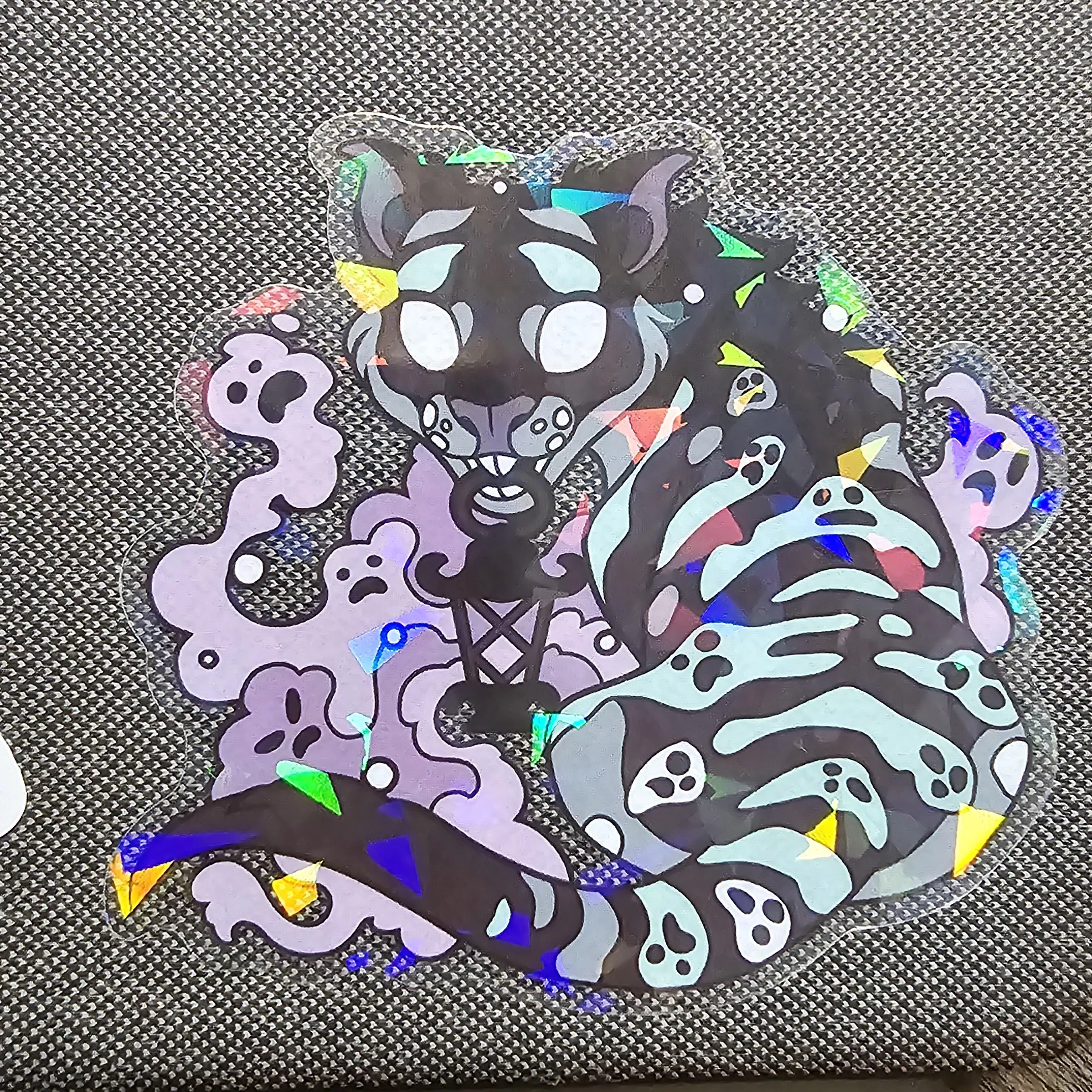 this may be the wrong place for this, but does anyone know the artist of this sticker? posted by unendlichkeiit
