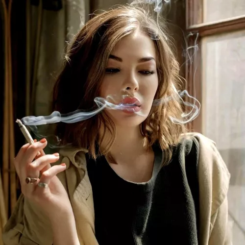 Fascinated by the allure of her own smoke by darkpoetries