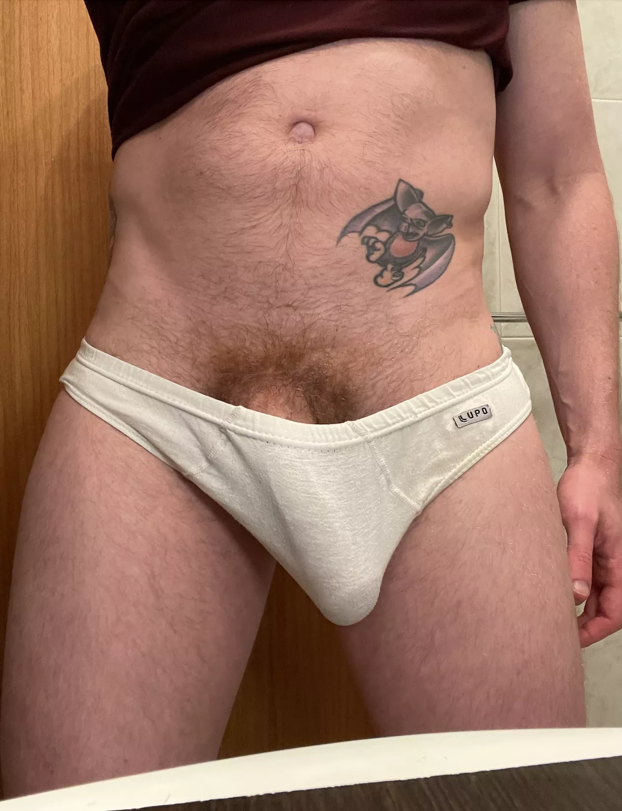 Tattoos with cock trapped underneath posted by Mikky-Mighty