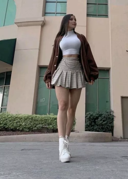 Busty and leggy beauty  by Tough_Path8397