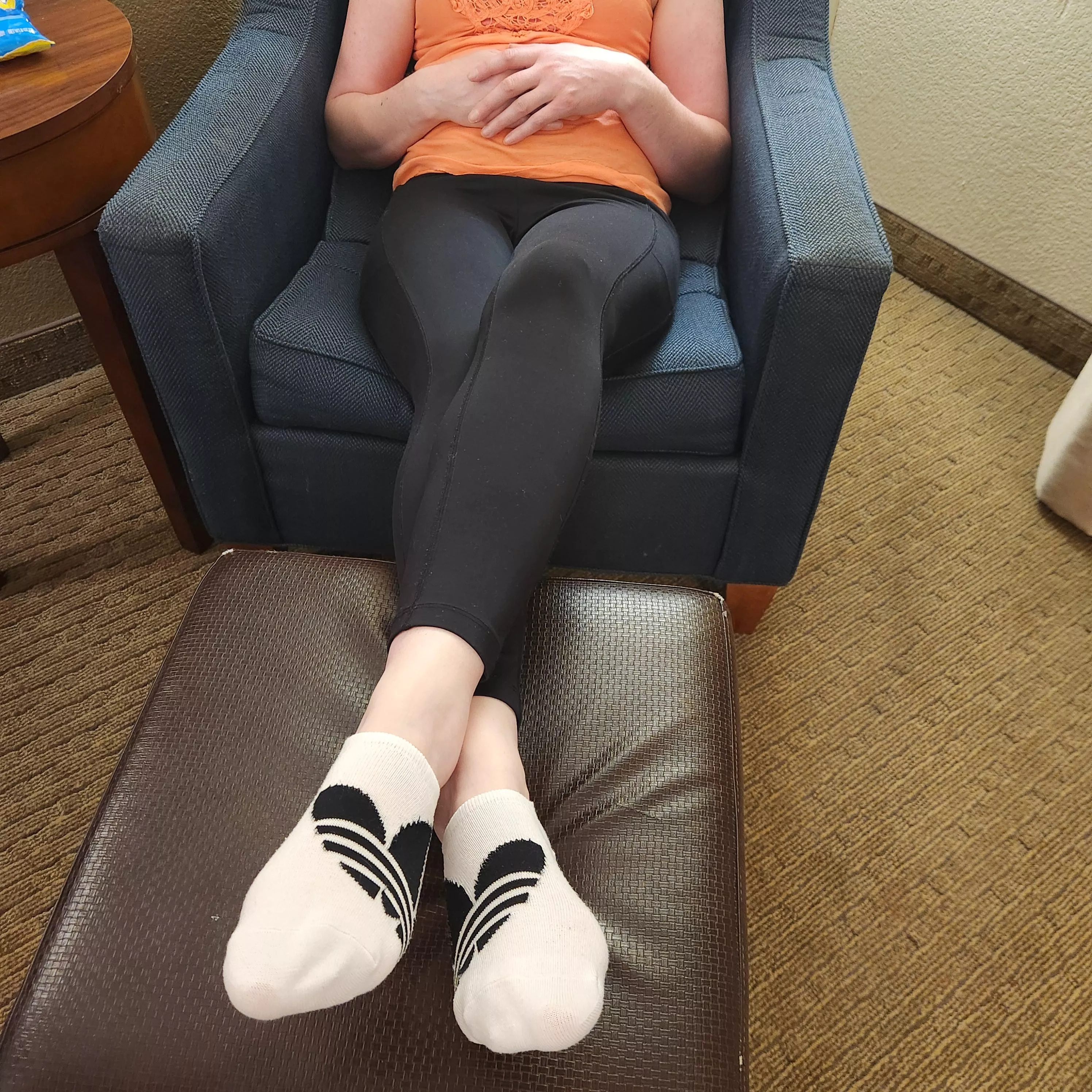 Crossed legs for the win. Love these white adidas socks. posted by leggingsgirl15