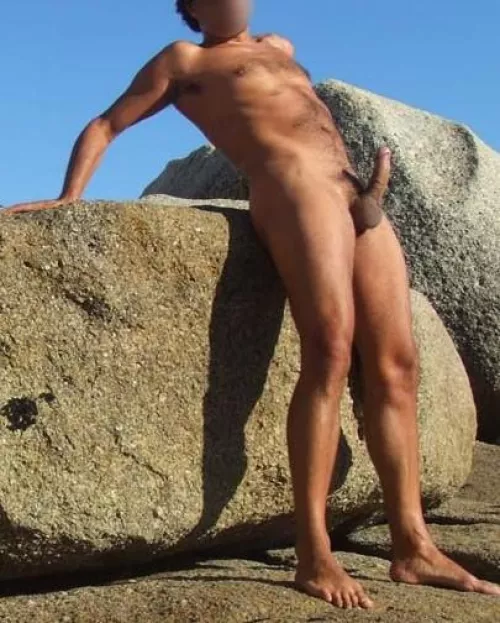 Full naked with a big erection on the rocks!!! by bialber