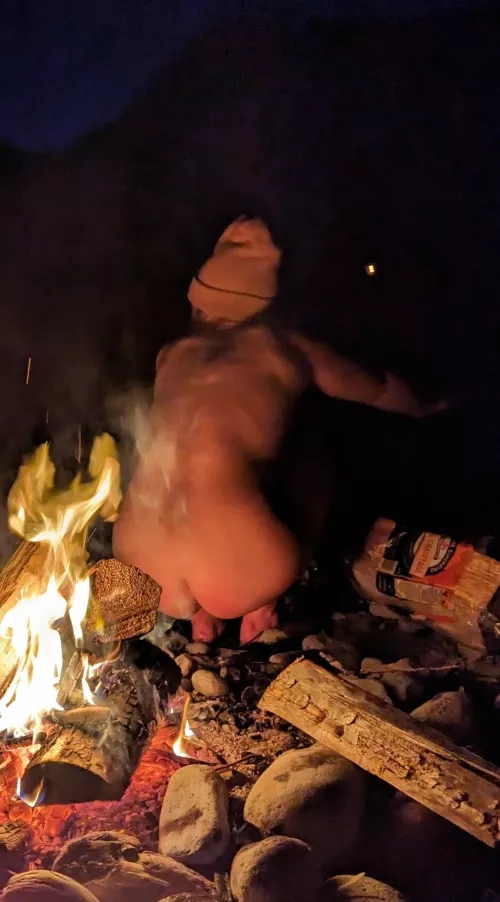 Warming up by the fire after a cold dip by KinkyClimber1