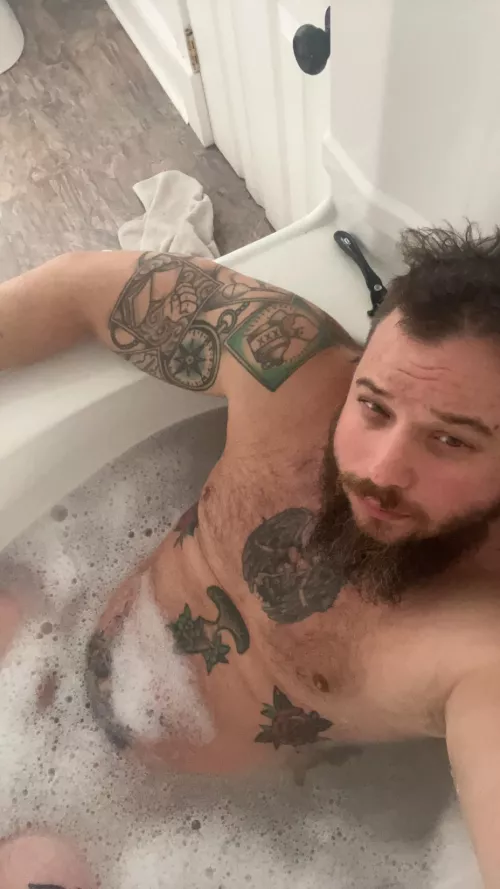 After demo, insulation, drywall, mudding, caulking and painting….I’m having a cocktail in the bath by Captainjustok