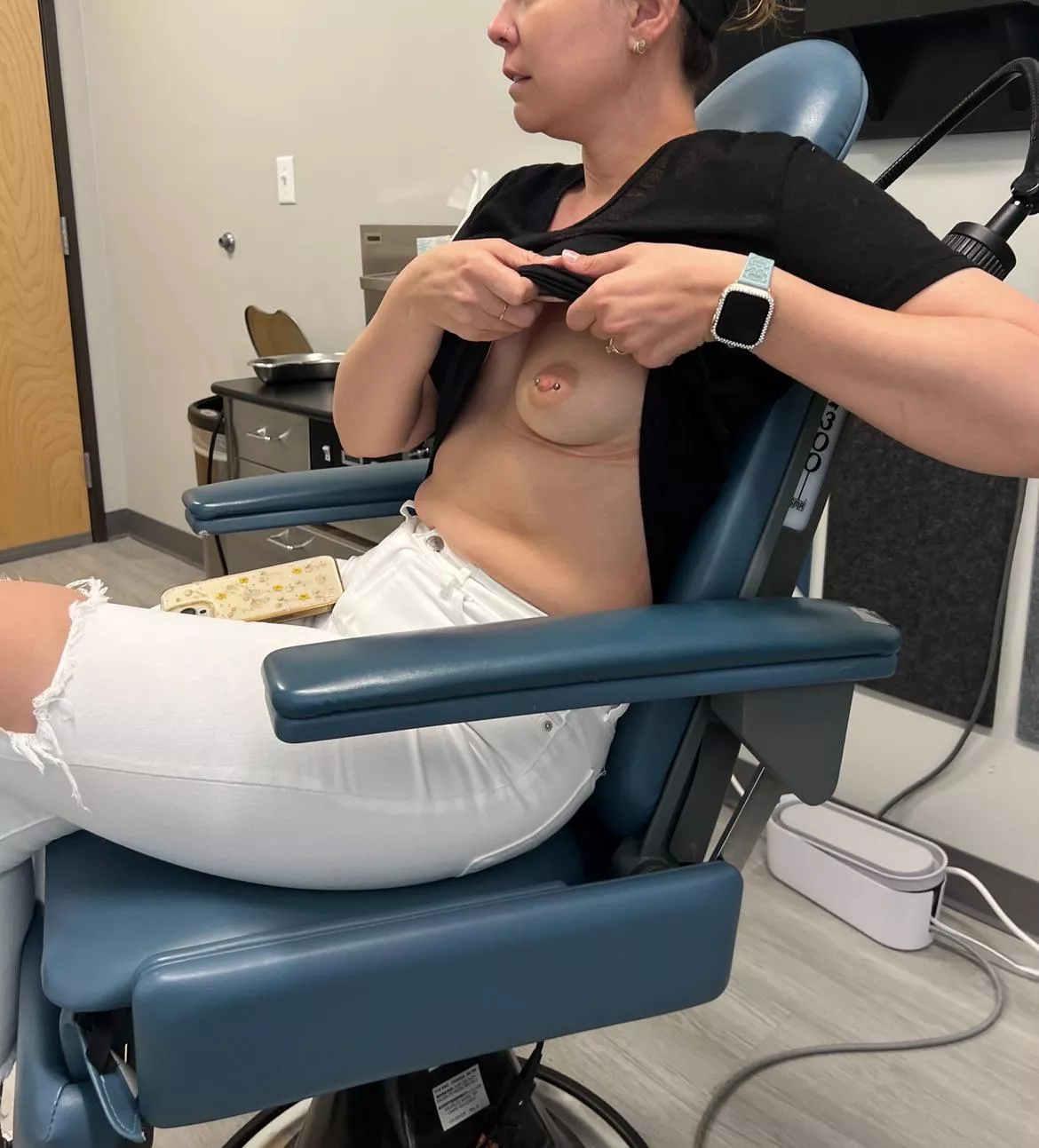 Wife flashing at the doctor.  posted by sexysluts2024