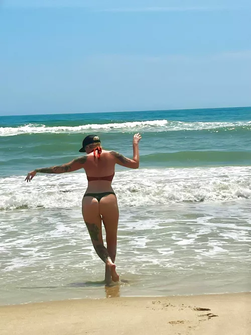 Peach on the beach  by the_naked_adventurer