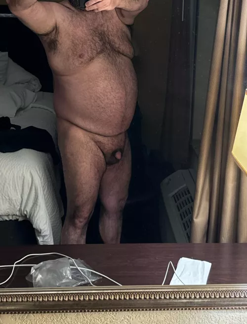 Standing in front of the hotel window  by Hairy_Bear1973