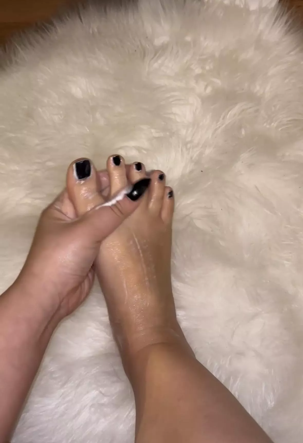 Applying cream to my feet  posted by FeetndFingersFantasy