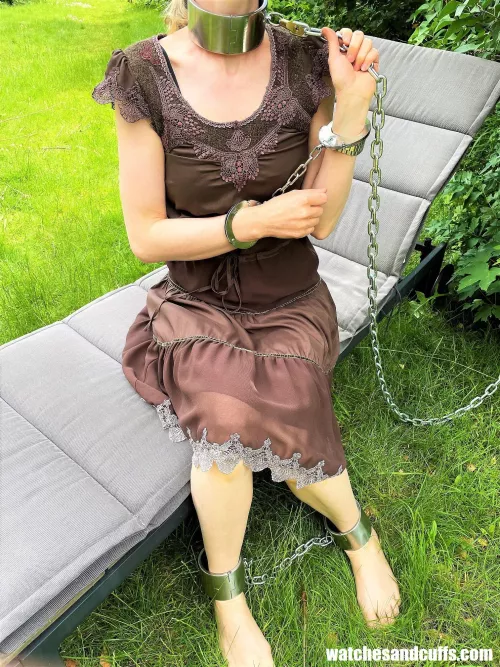 Time to read a good book. Nothing else to do when I'm chained like this! by JessicaShackled