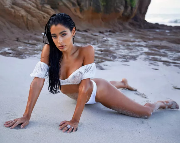 Ashy alone on a beach  by ashydeluca