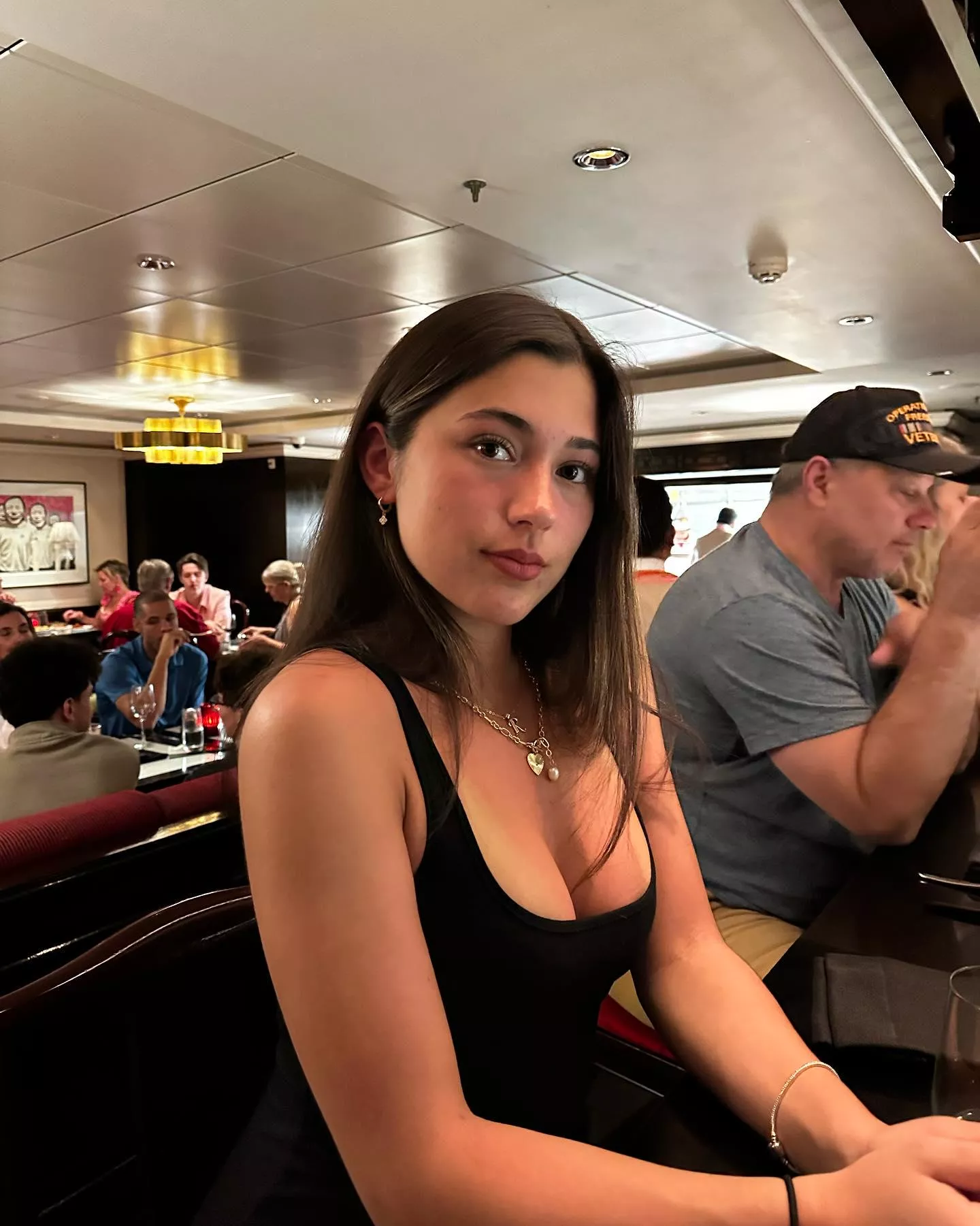 Brunette in black posted by Practical-Kitchen194