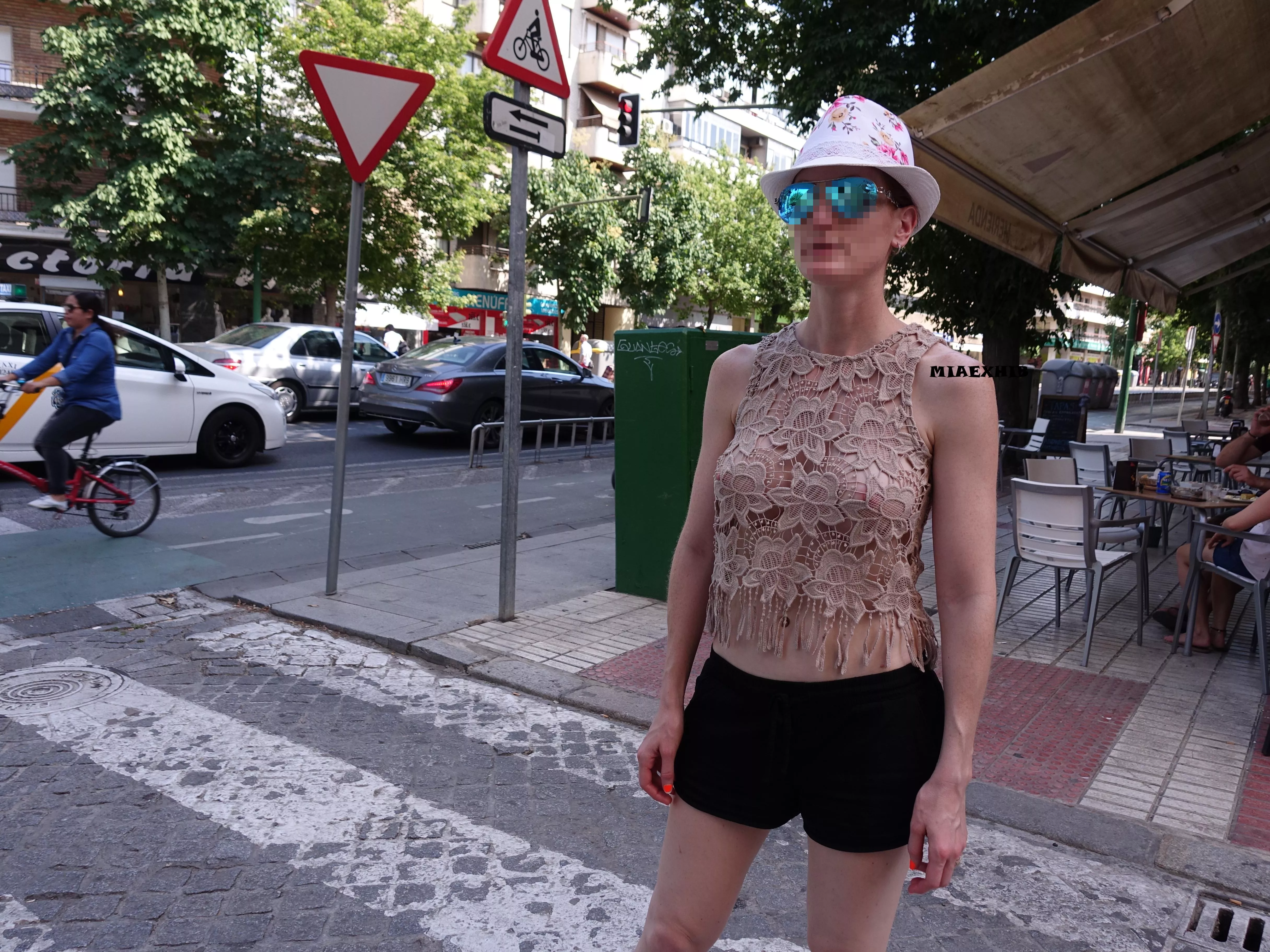 Taking a walk in the city with my nipples showing through my top posted by miaexhib