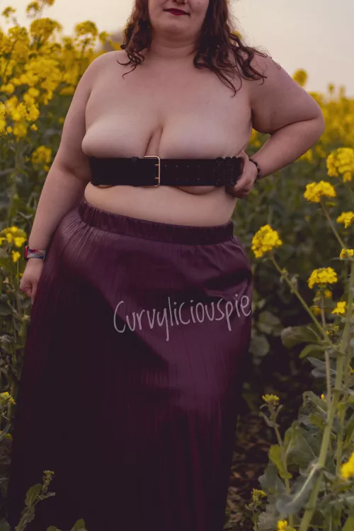 Tits out in a canola field by curvyliciouspie