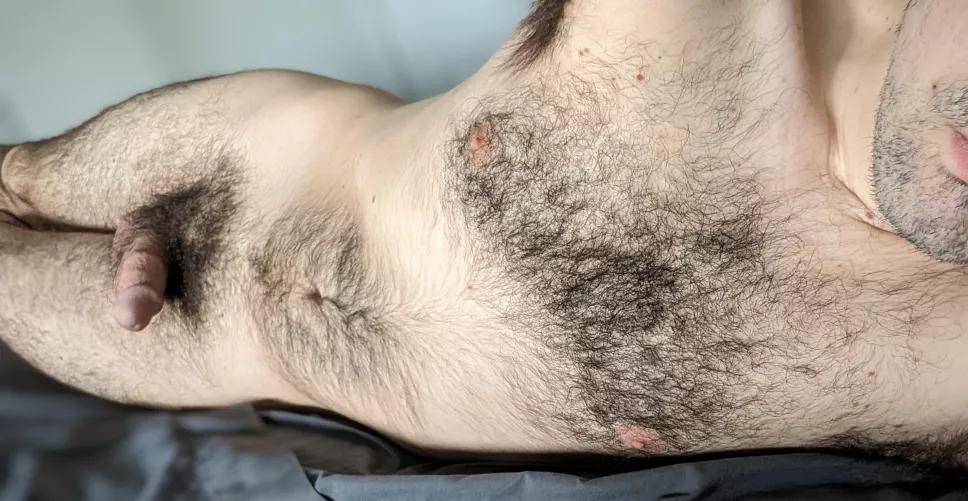 Laying in bed nude with a softy by Rod-Hard7