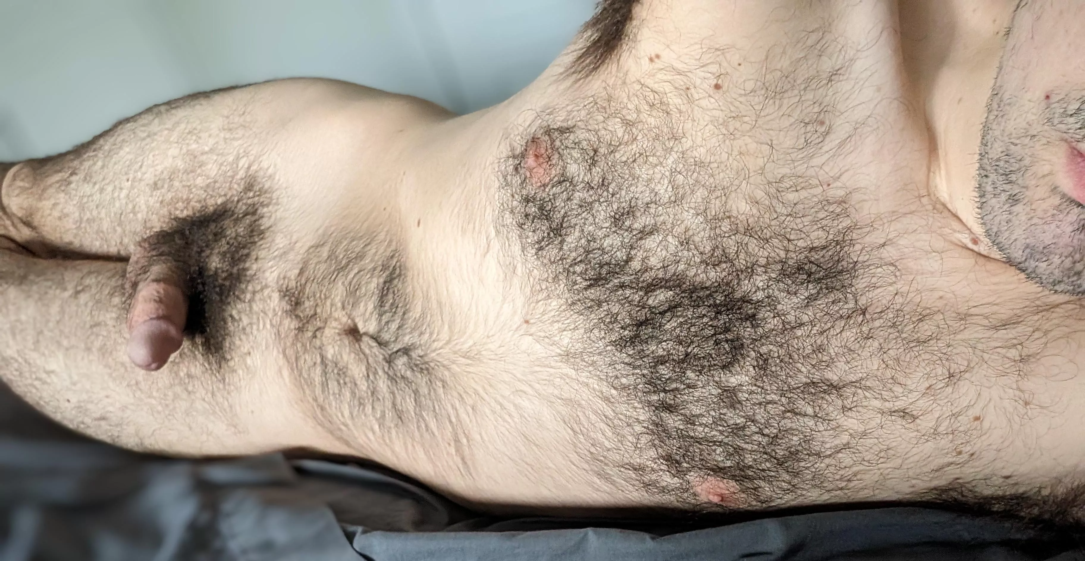 Laying in bed nude with a softy posted by Rod-Hard7