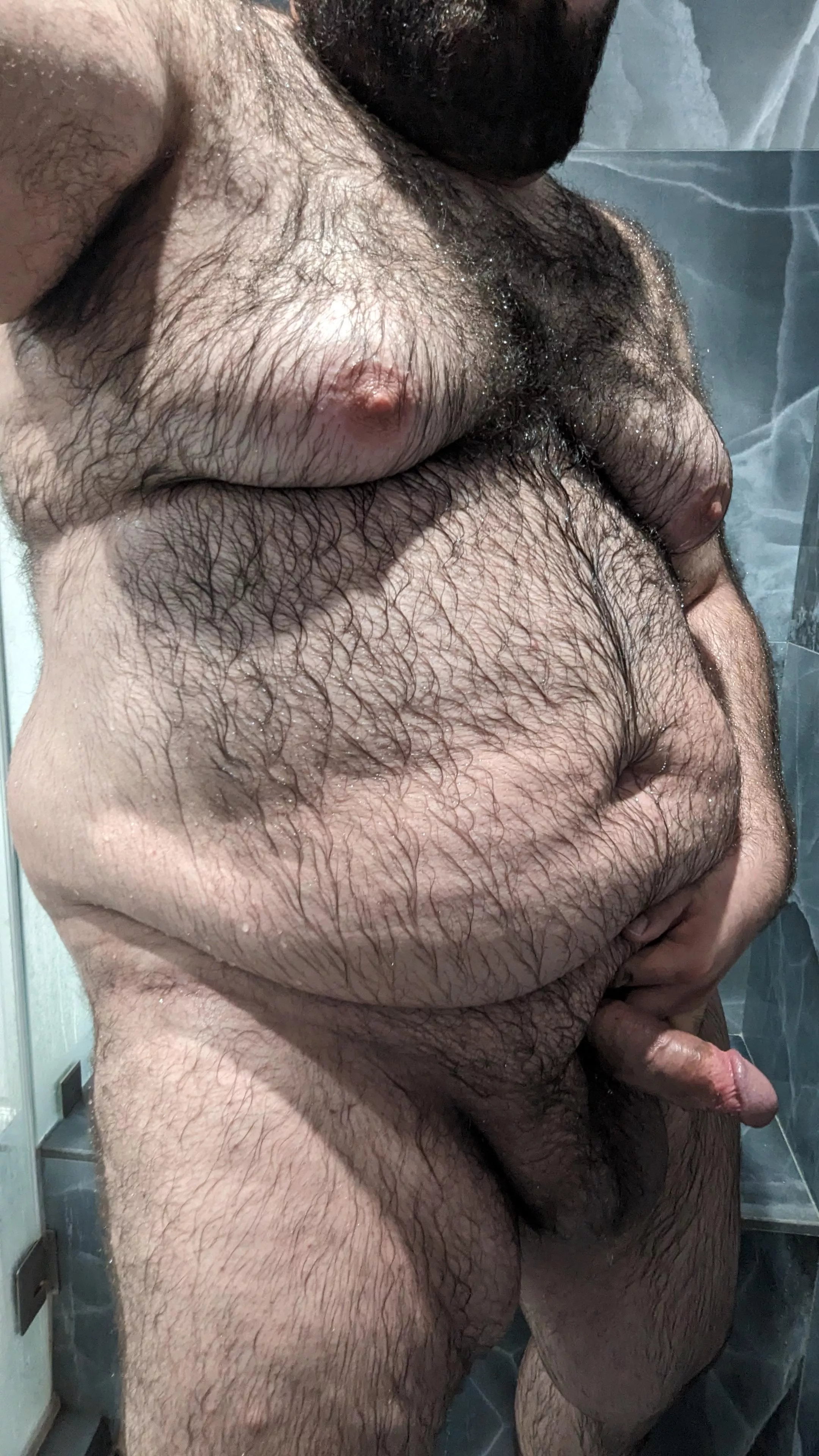 Hairy man in shower  posted by NakedMrGamer