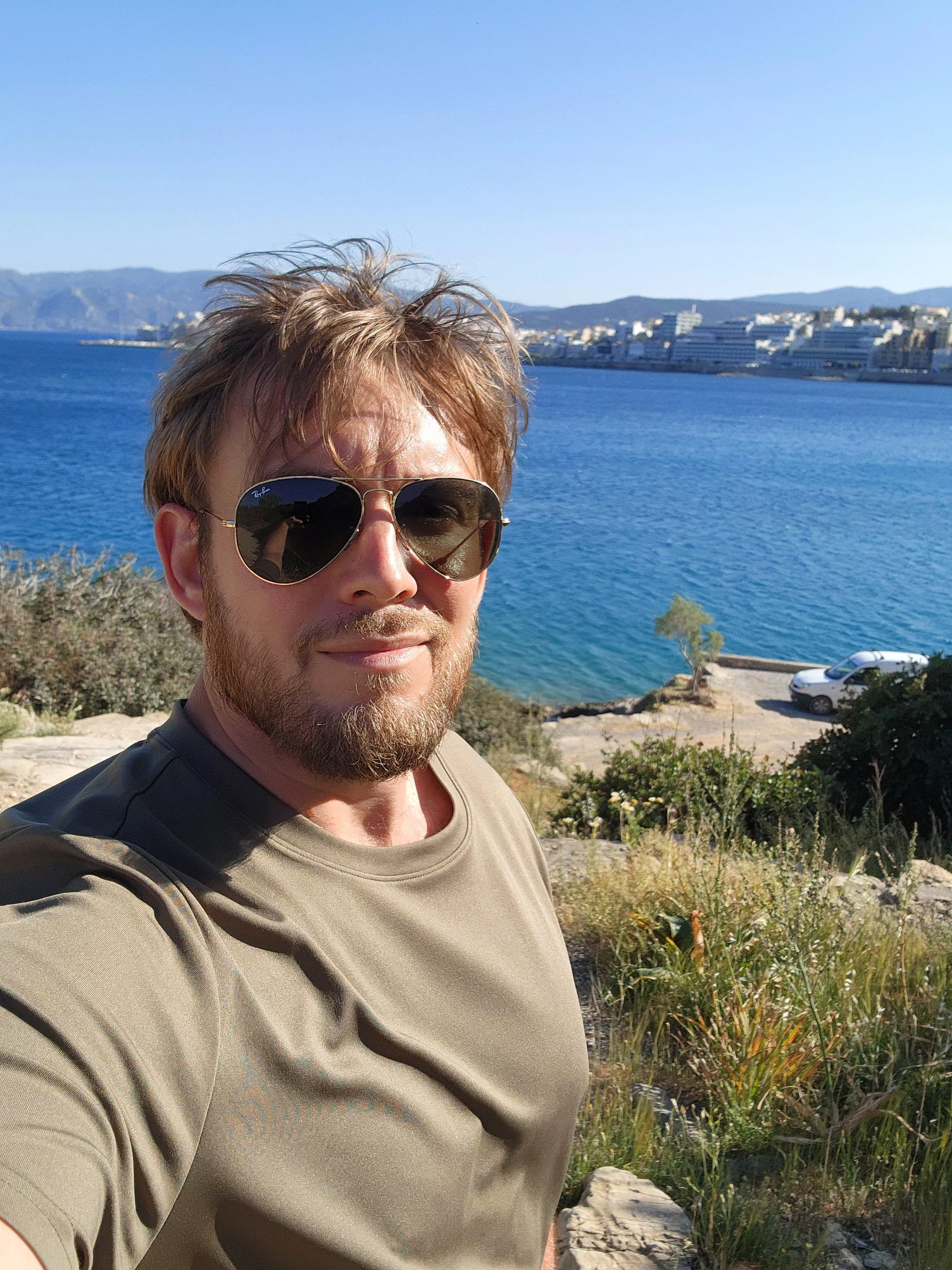 Just a guy walking by the beach posted by LongJohnDeacon