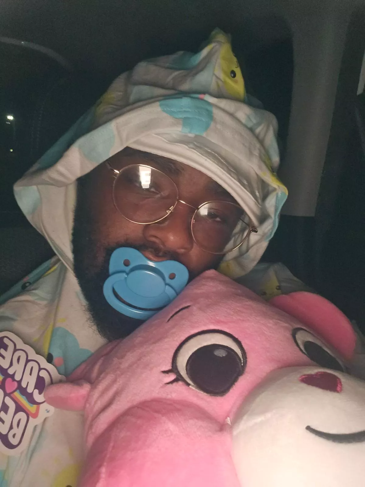 Snuggling with a friend's stuffie. posted by Whitedrago16