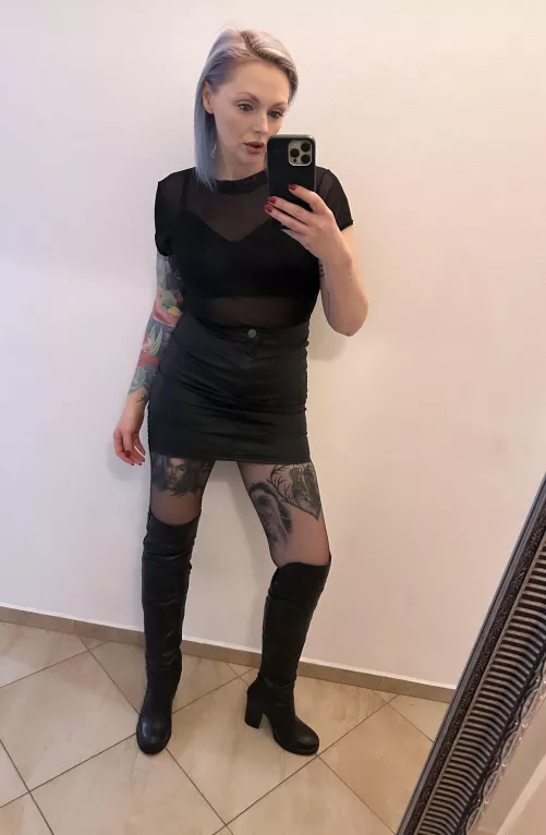 Tight mini skirt and black pantyhose by theinkedsiren1