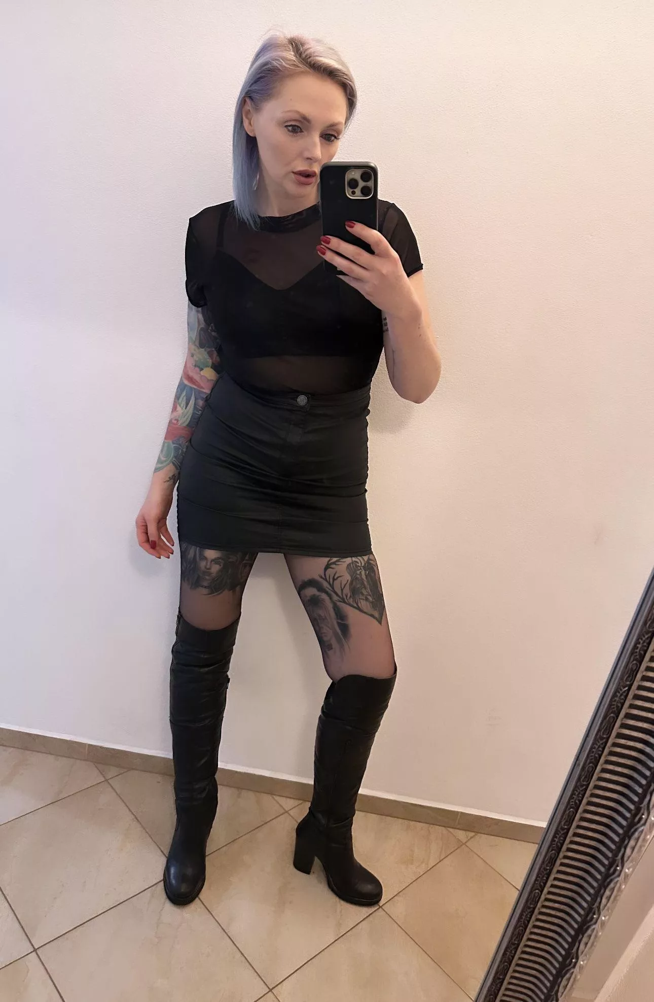 Tight mini skirt and black pantyhose posted by theinkedsiren1