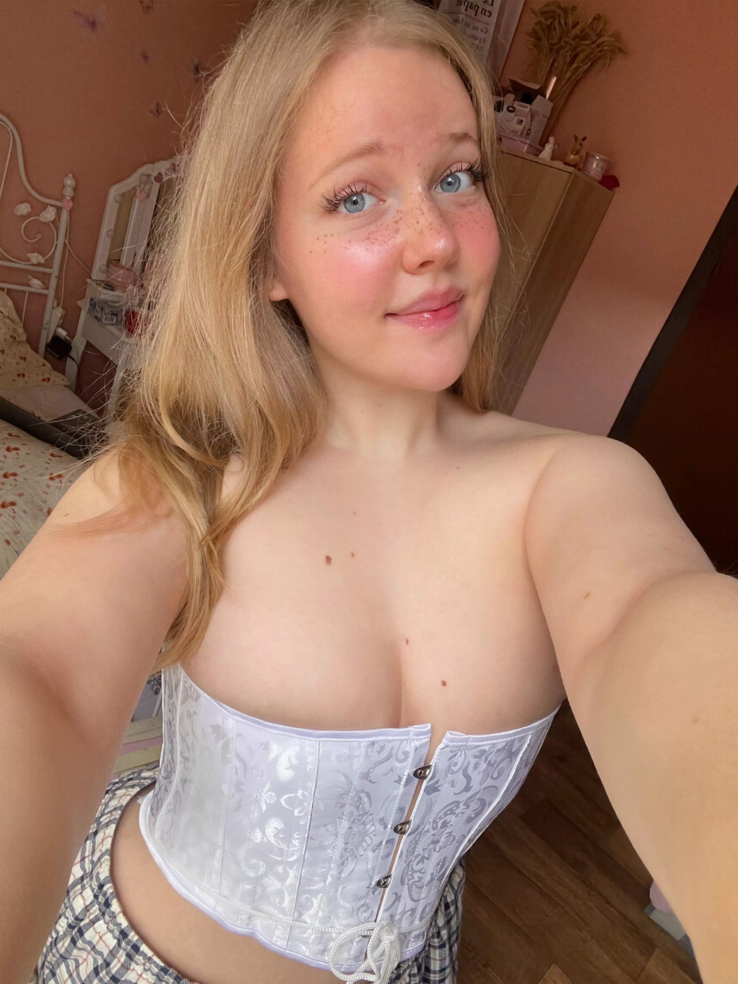 Do you like this white corset on me? posted by Helvegen6
