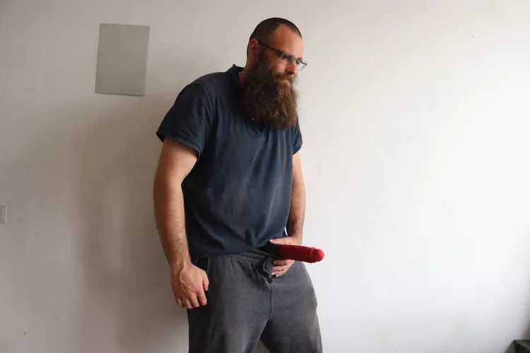 Me, while I'm holding a red dildo in front of me by Mysterious-Man1