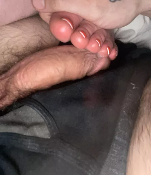 Snuck my D under her toes while she napped. Rate our pic 1-10? by Kind_Sock_9521