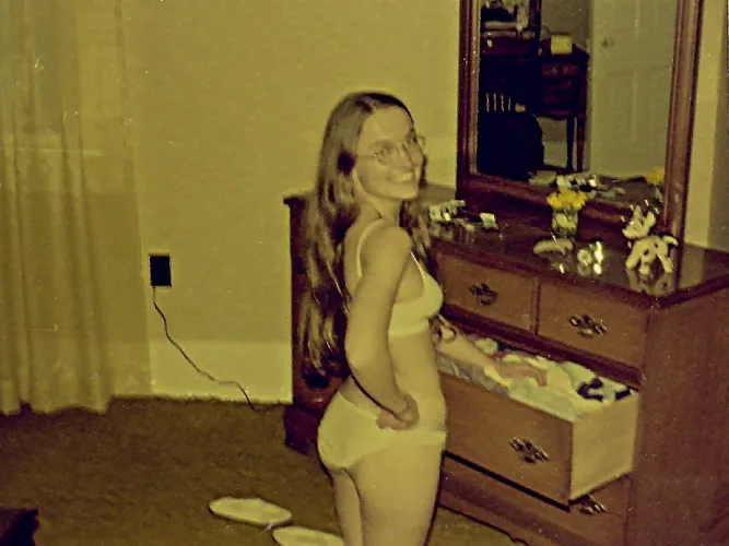 Putting laundry away on our hippie commune - early 1970s. I'm on my knees - I'm not that short! by thighsgentlyparting