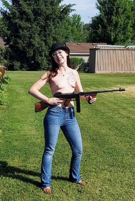 Topless Thompson shooting (model 1928 in 45ACP) posted by MistressThrope