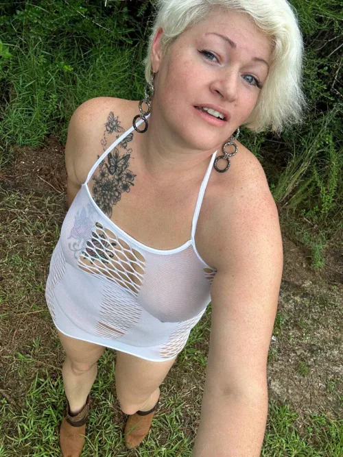 Taking my fishnets outside by lalababydoll123