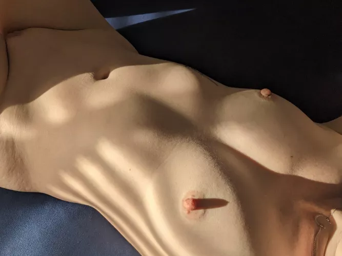 That left nipple shadow is impressive. by TOYST_OF