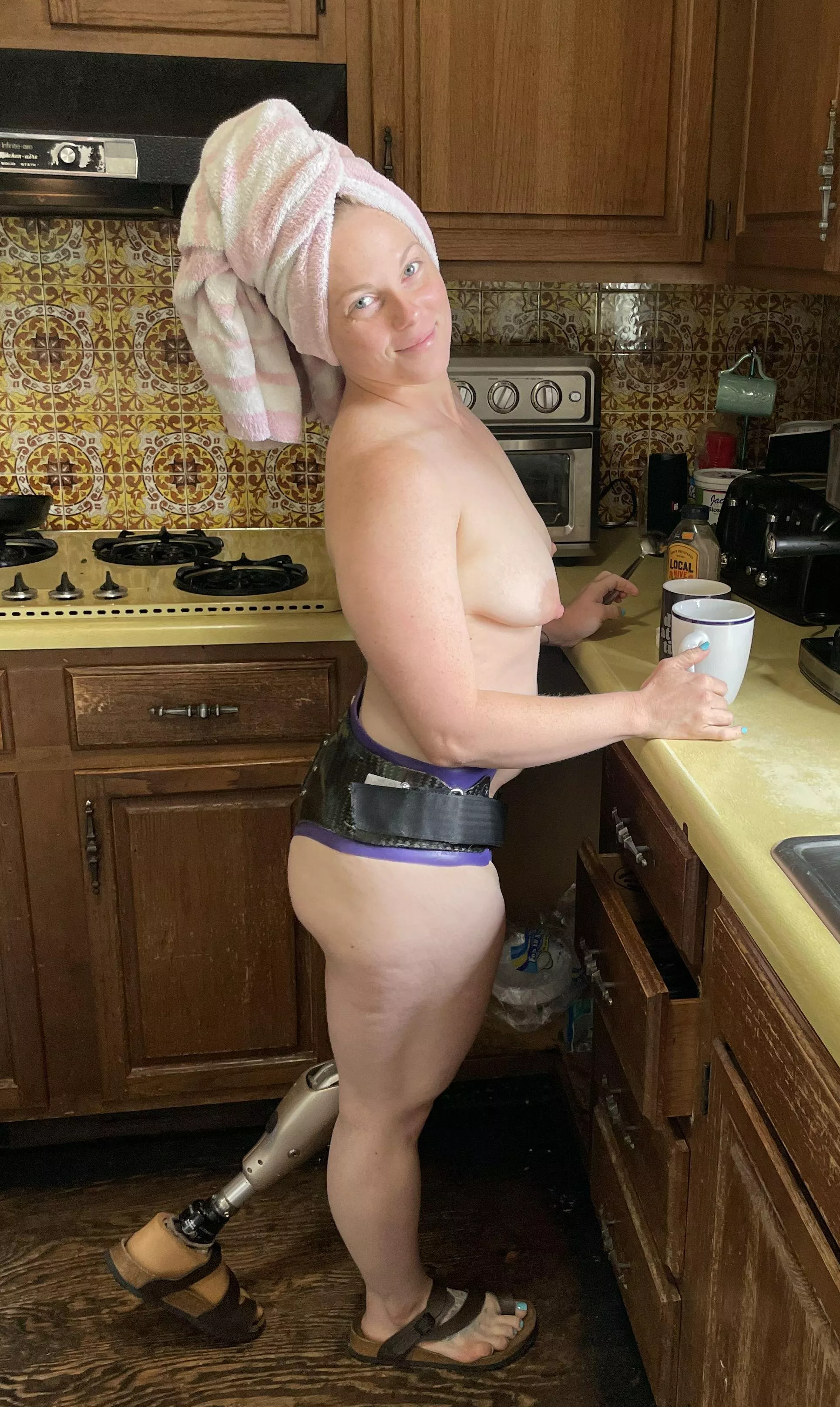 Cyborg milf making her morning coffee posted by Amputeelove